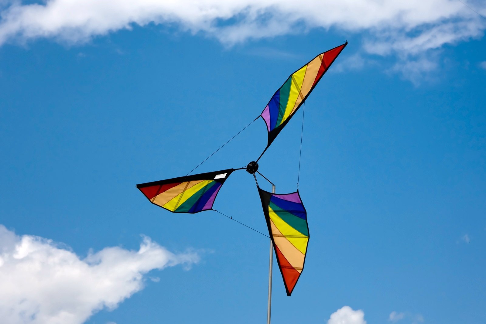 a close up of two kites in the sky