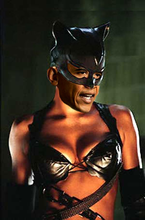 a woman wearing black latex and catwoman mask