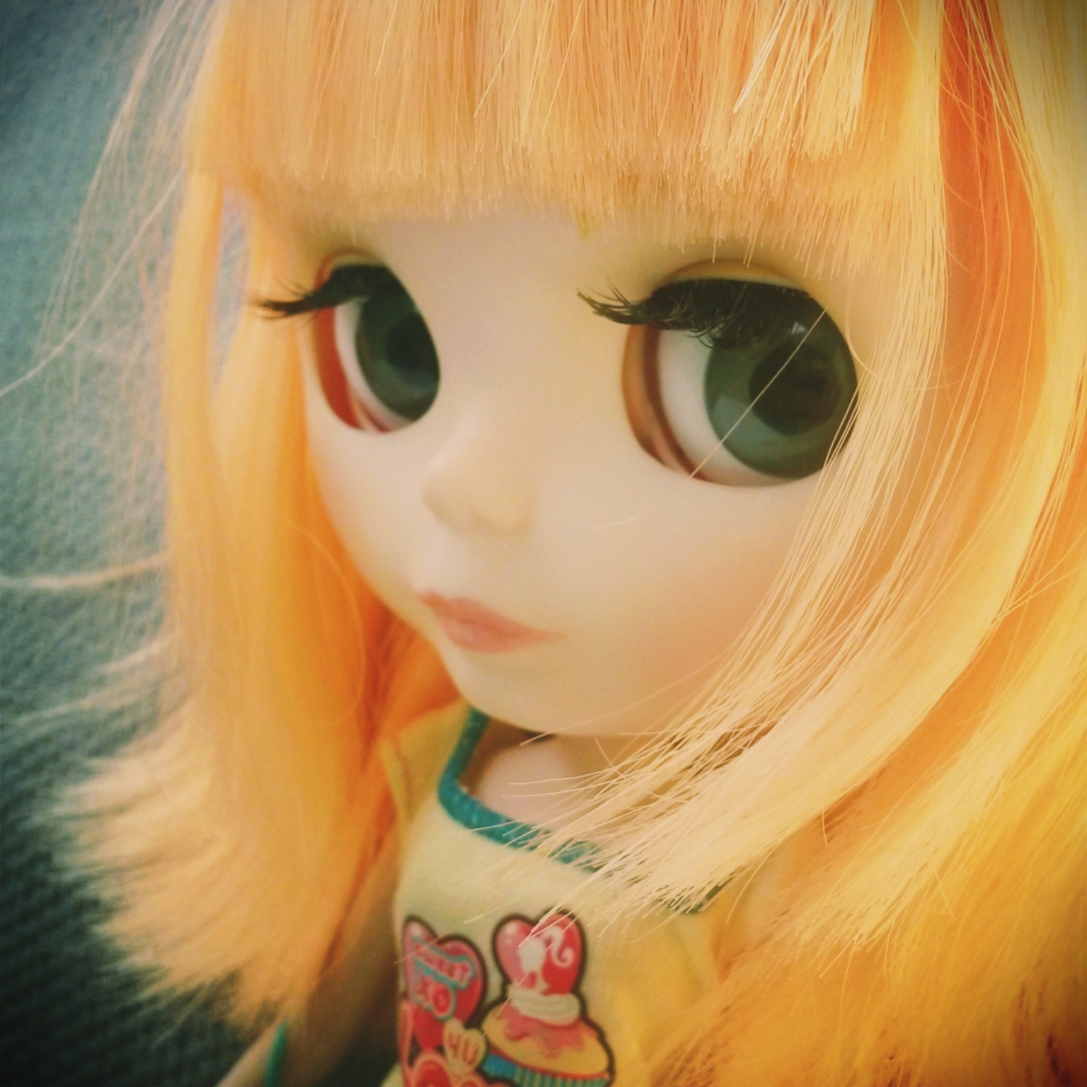 this is a doll's yellow hair and green eyes