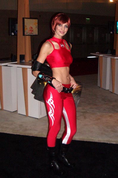 a woman is dressed in all red with an interesting outfit