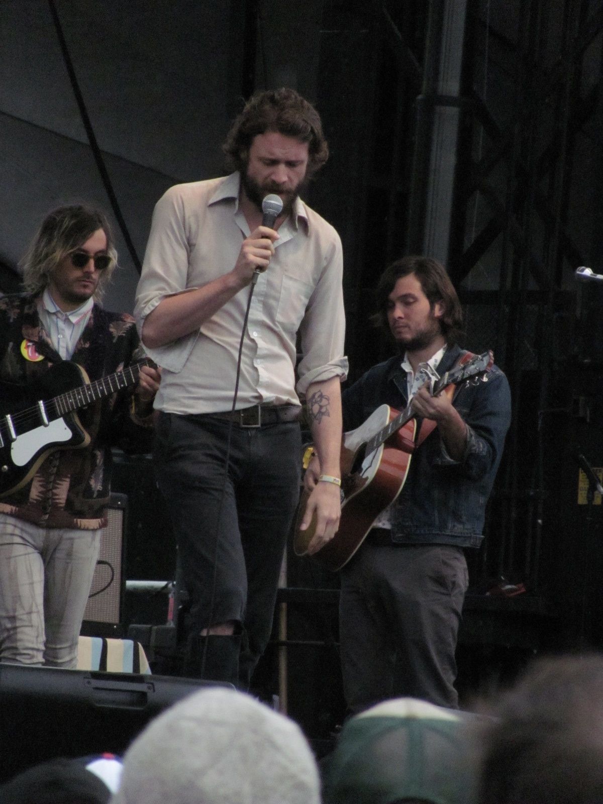 the musicians are playing music together at the concert