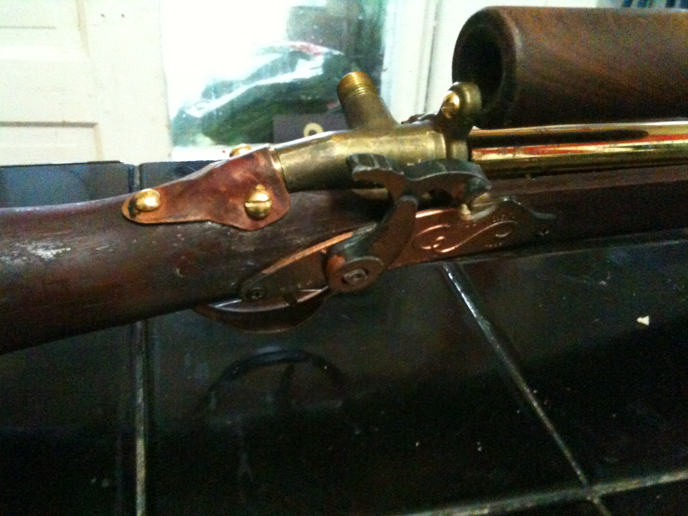 the very old rifle is still in its holders
