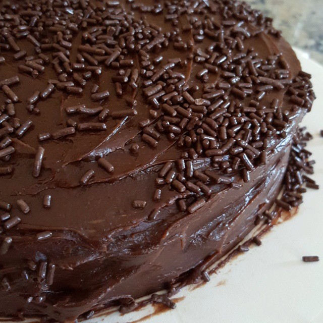 the cake is covered in chocolate sprinkles
