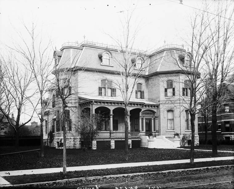 a vintage po of an old victorian home