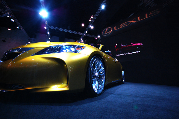 this is a yellow sports car on display