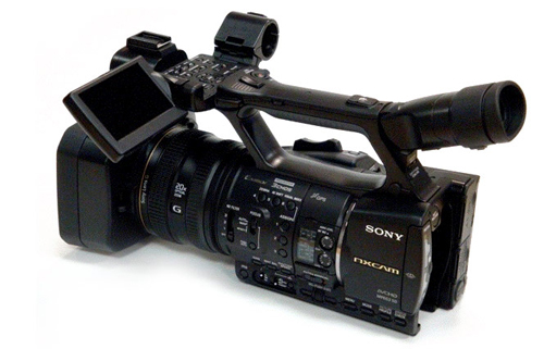 a sony camcorder with a camera attached