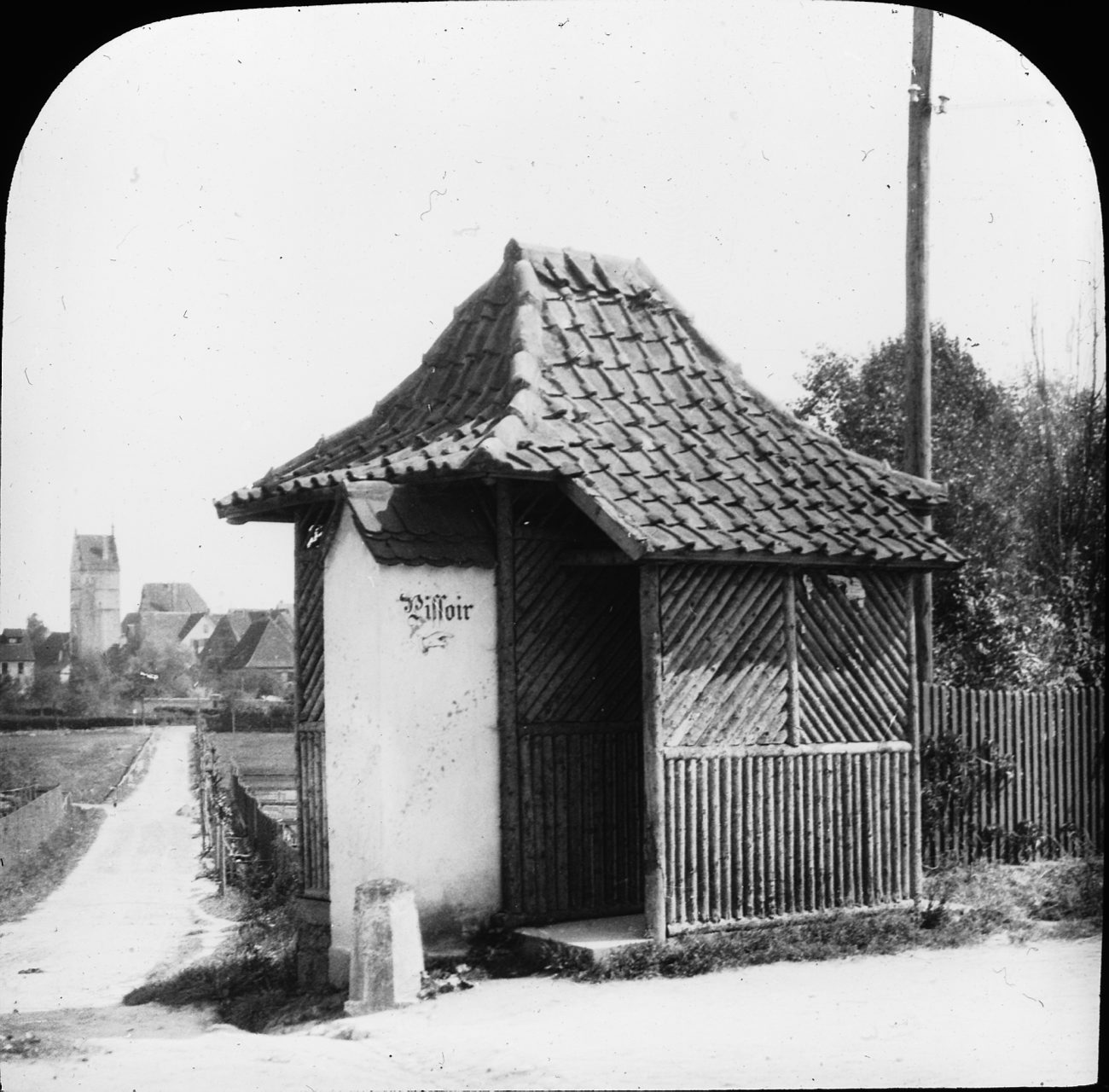 an old black and white po of a small hut