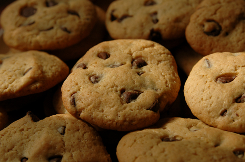 a close up of cookies in a pile on a table