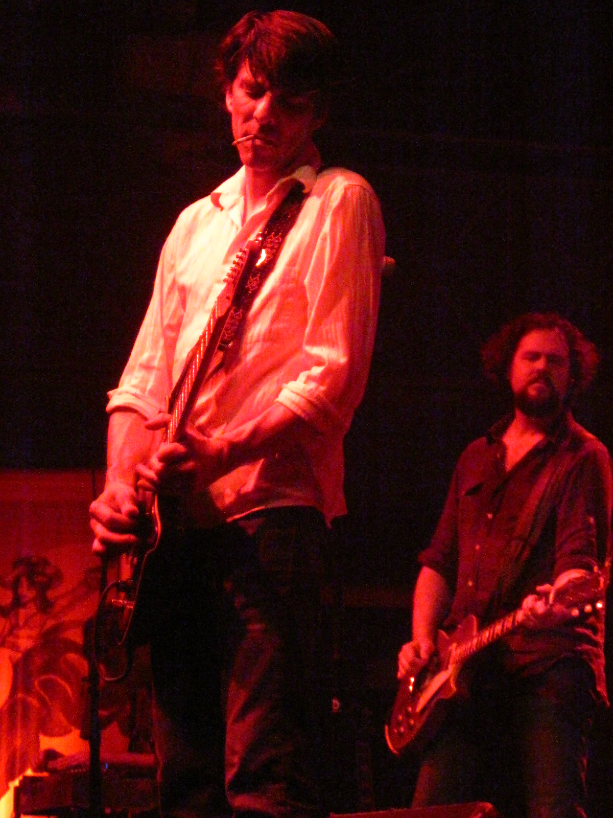 two male musicians at a concert