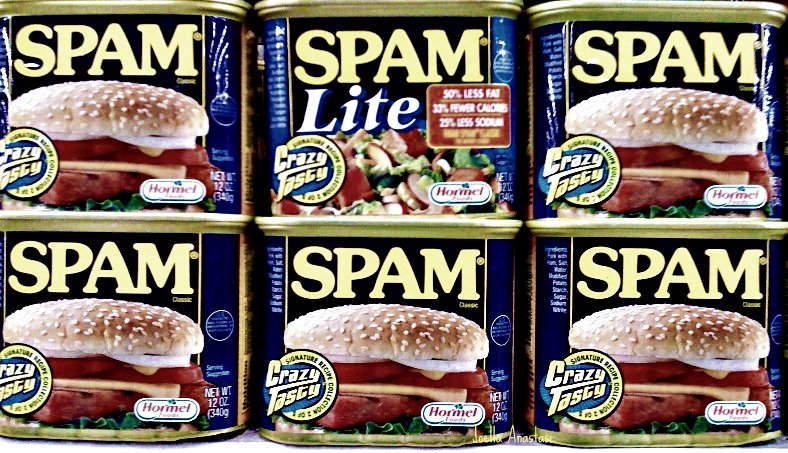six cans of spam lite are pictured in this image