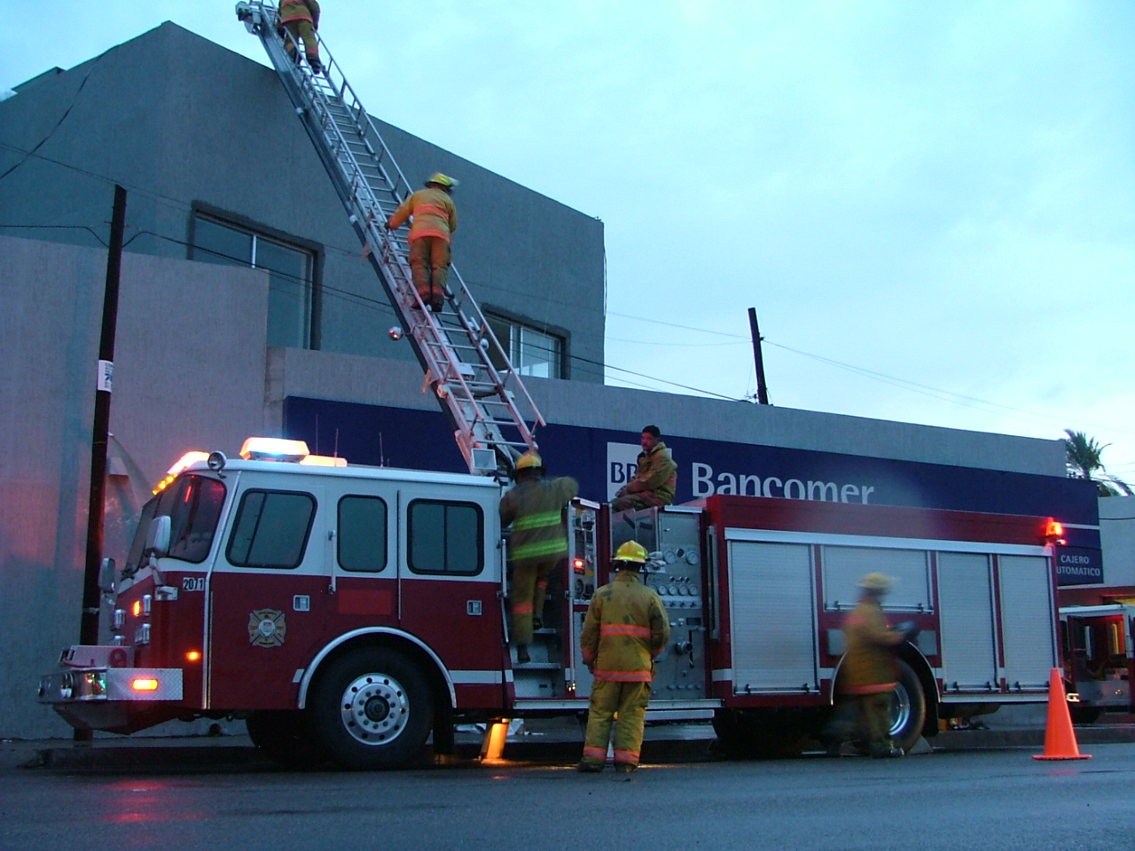 a firetruck that is parked next to a building