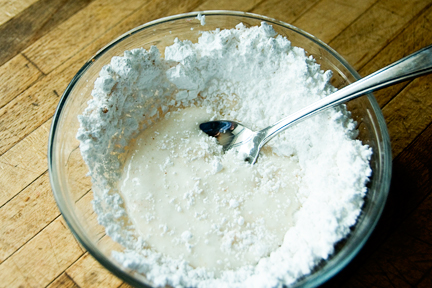 a large bowl is filled with sugar and sugar on the table