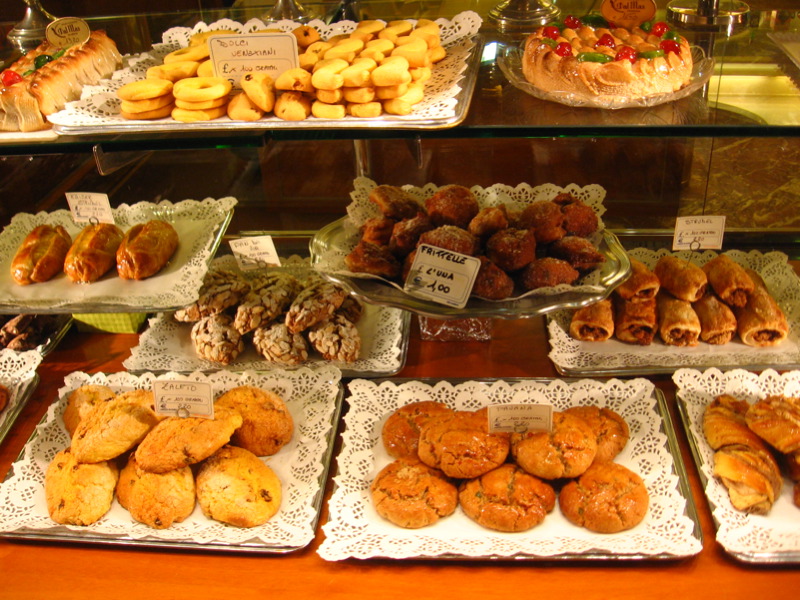 different kinds and flavors of pastry sitting on display