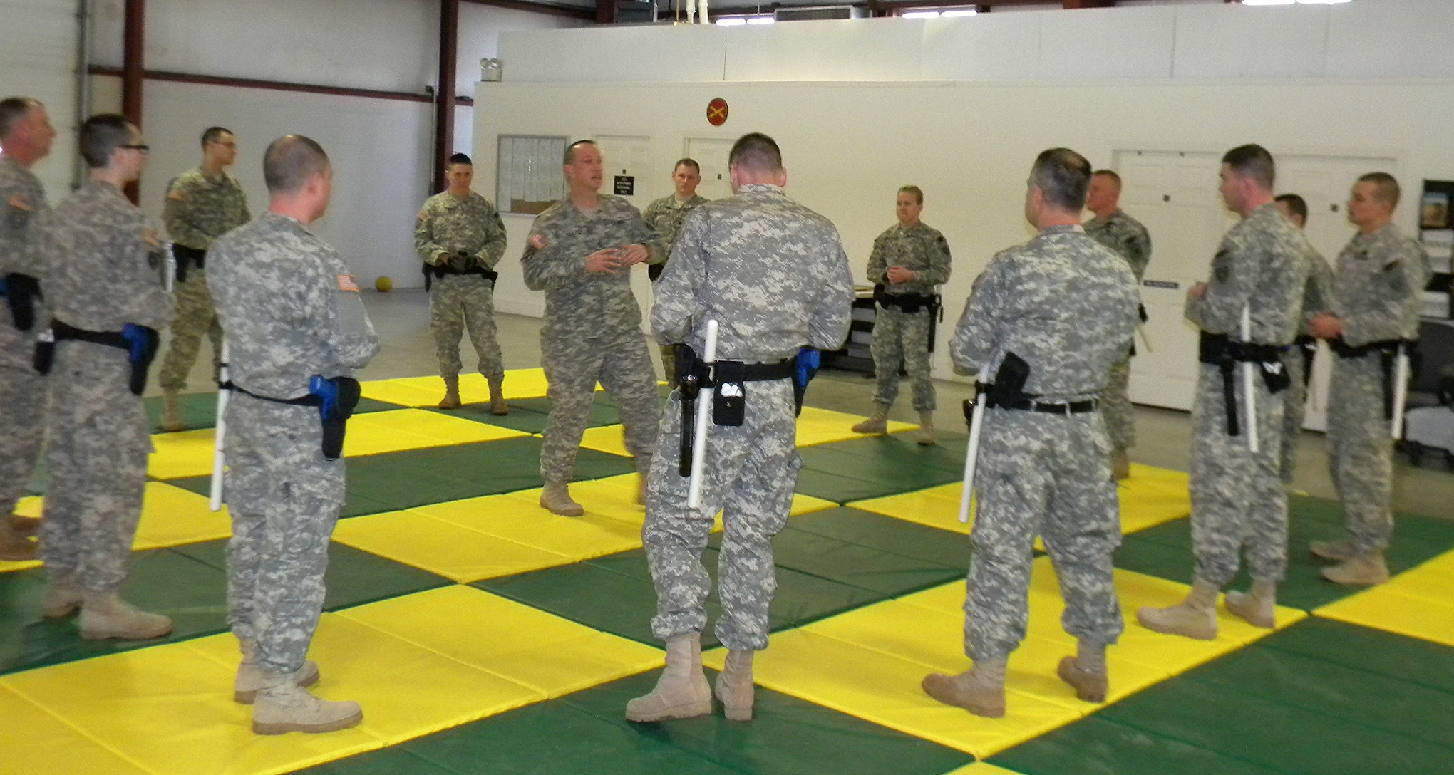 a group of men standing in a room