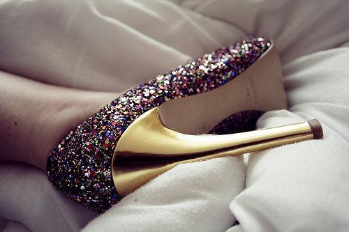 this high heel shoe is covered in sparkling glitters