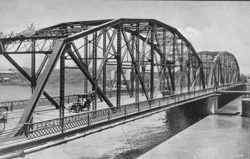 an old po of the railroad bridge on the river