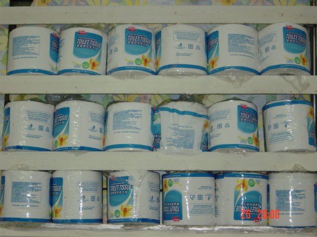 a shelf filled with lots of blue and white baby formulas