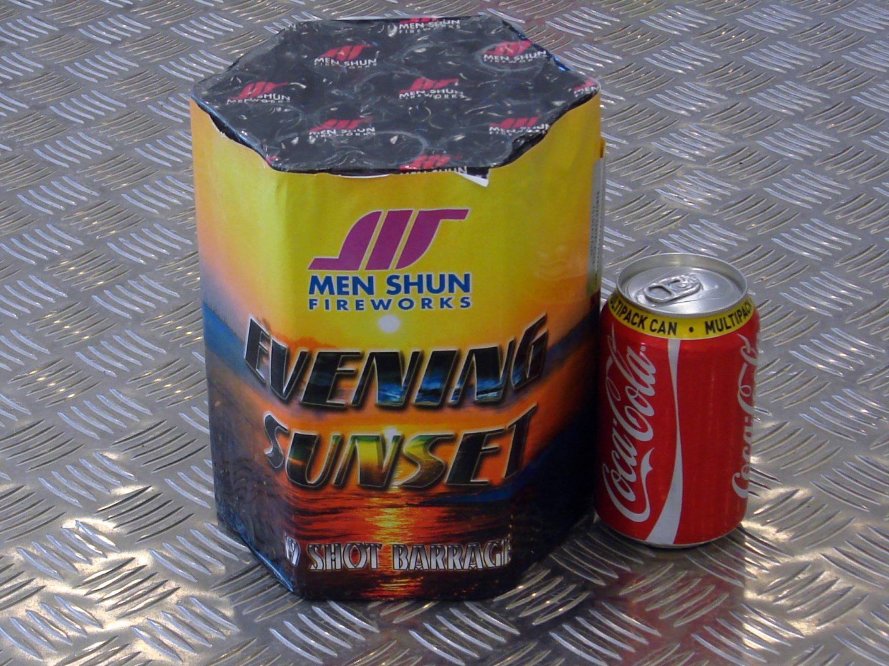 can and canister on shiny metal surface