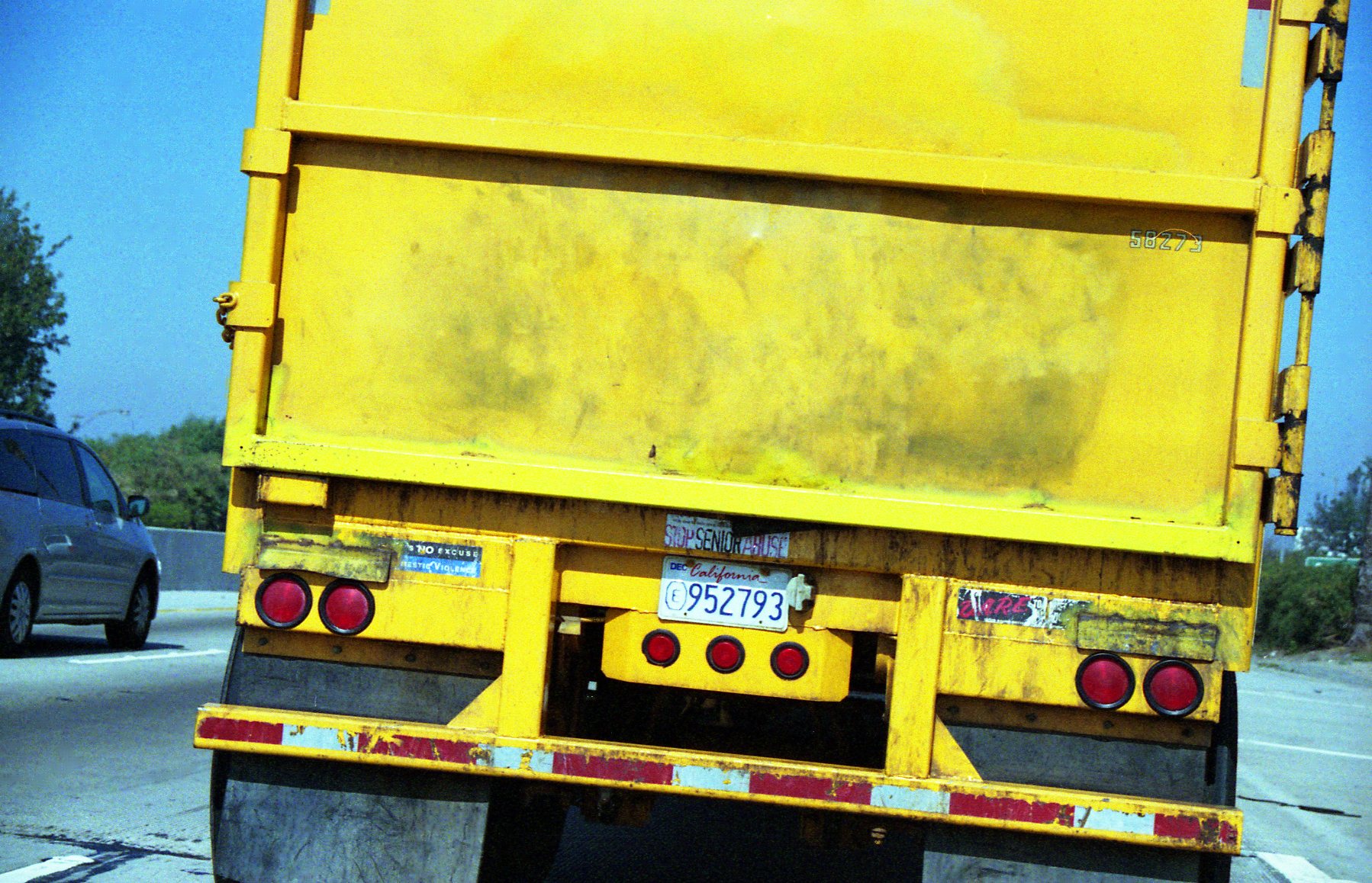 a large truck parked at the side of the road