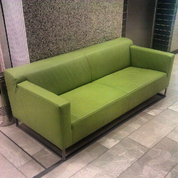 this is an image of a green sofa