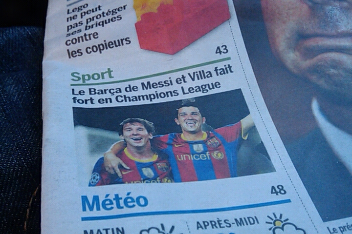 a newspaper featuring an image of barca del villa and mario