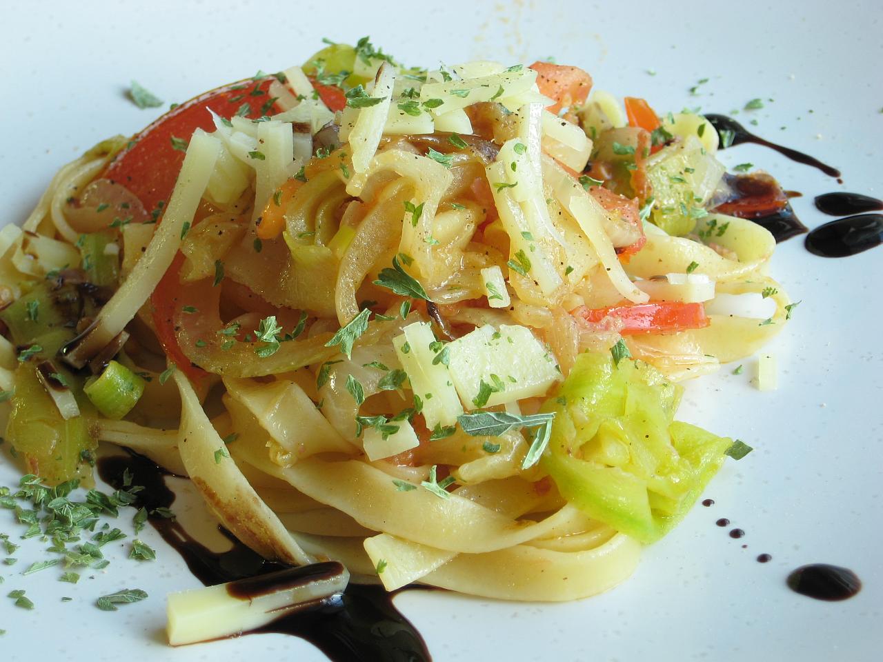 a plate is filled with a dish of food