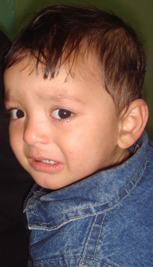 a close - up of a young child's face