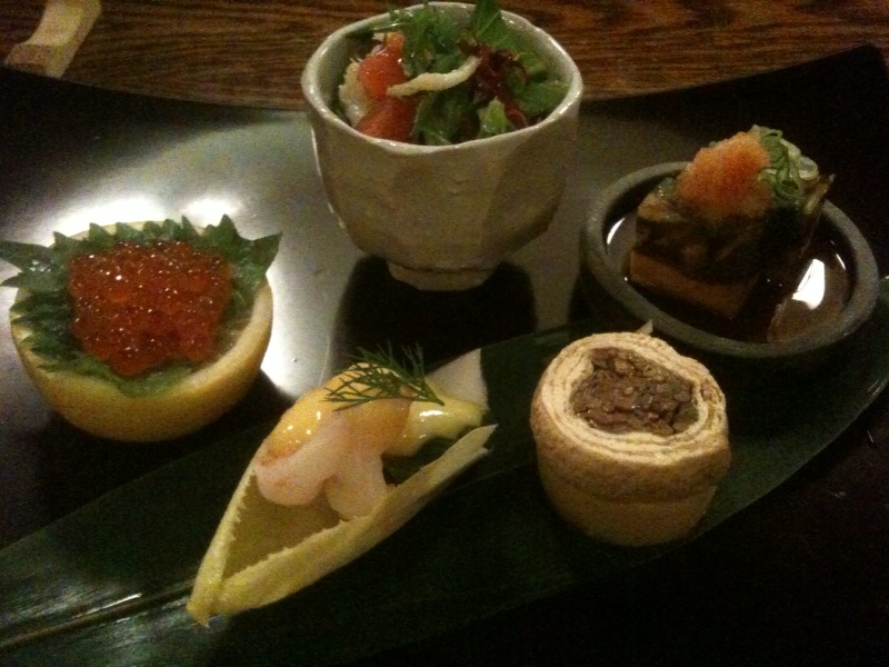 the three sushi dishes are arranged on the plate