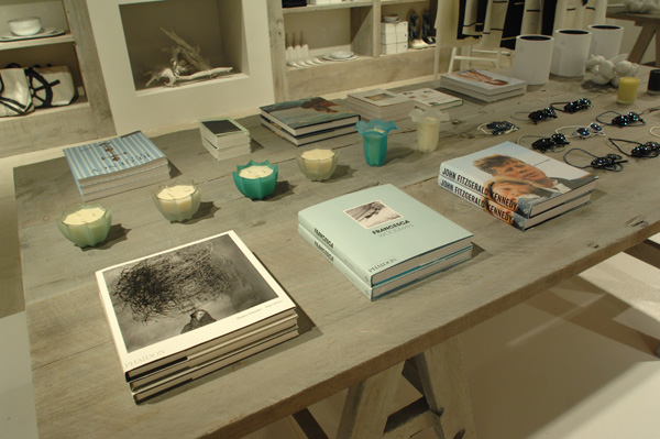 an assortment of books on table in a store