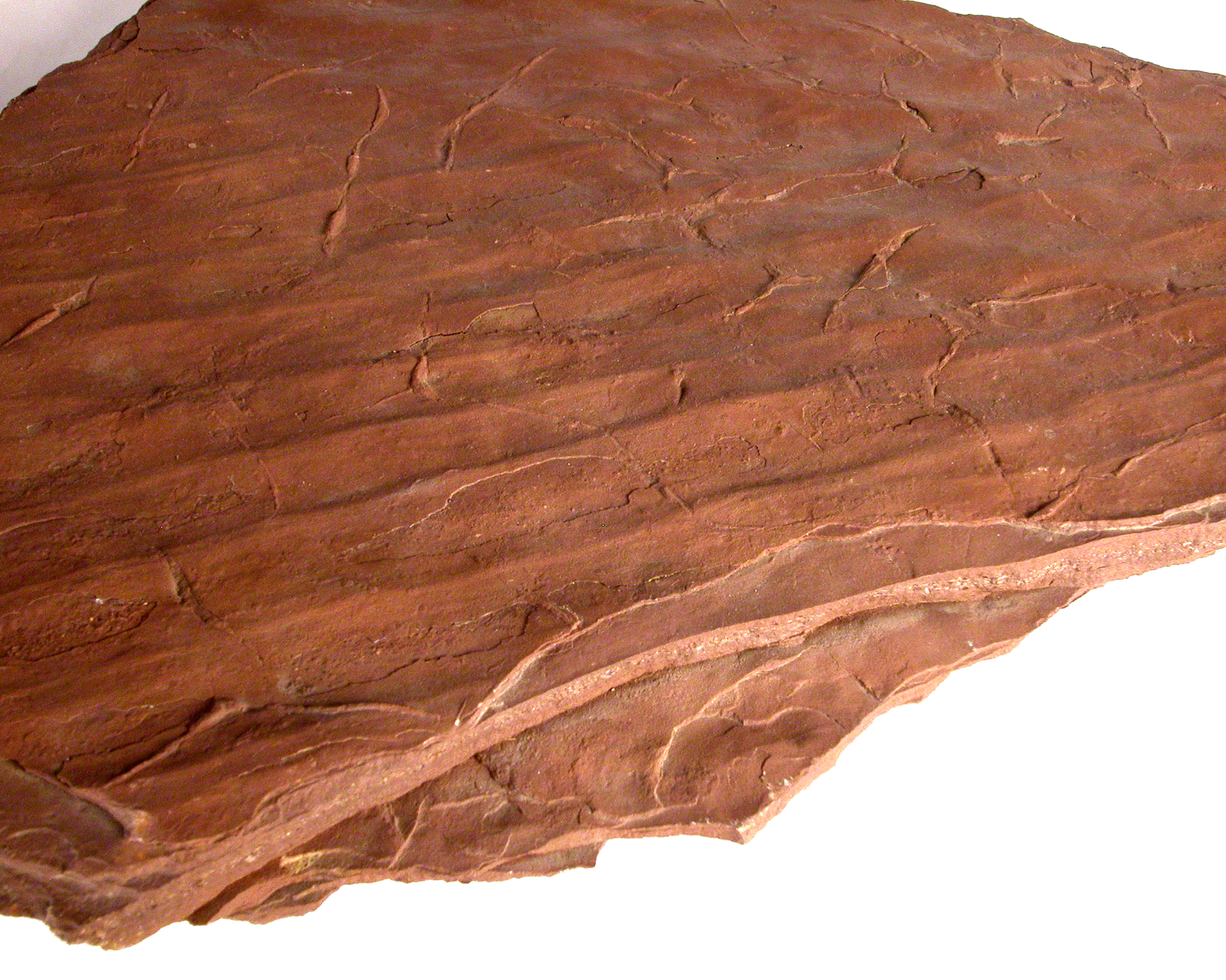 a wooden slab with many layers of rock