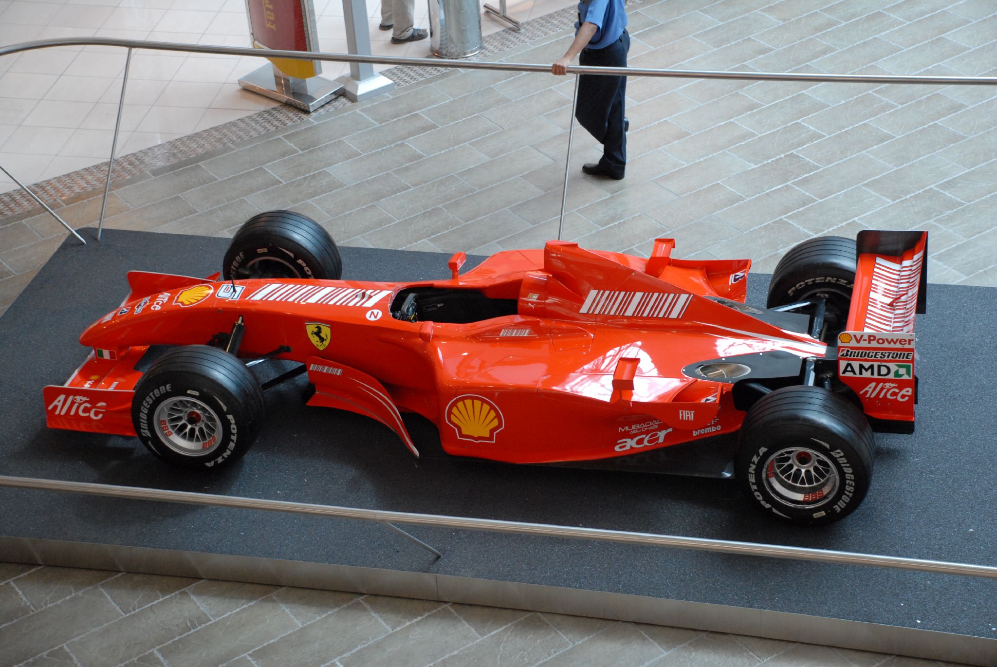 a formula racing car on display at a museum
