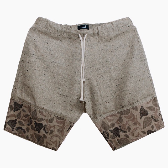 a short pants with a brown and black pattern on it