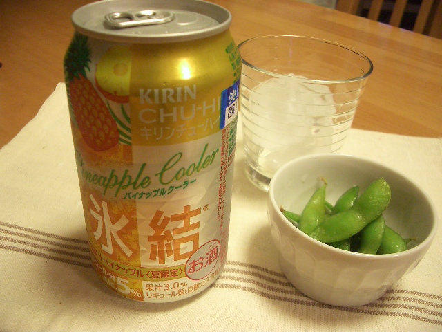 a can of juice with green beans and a bowl full of sugar