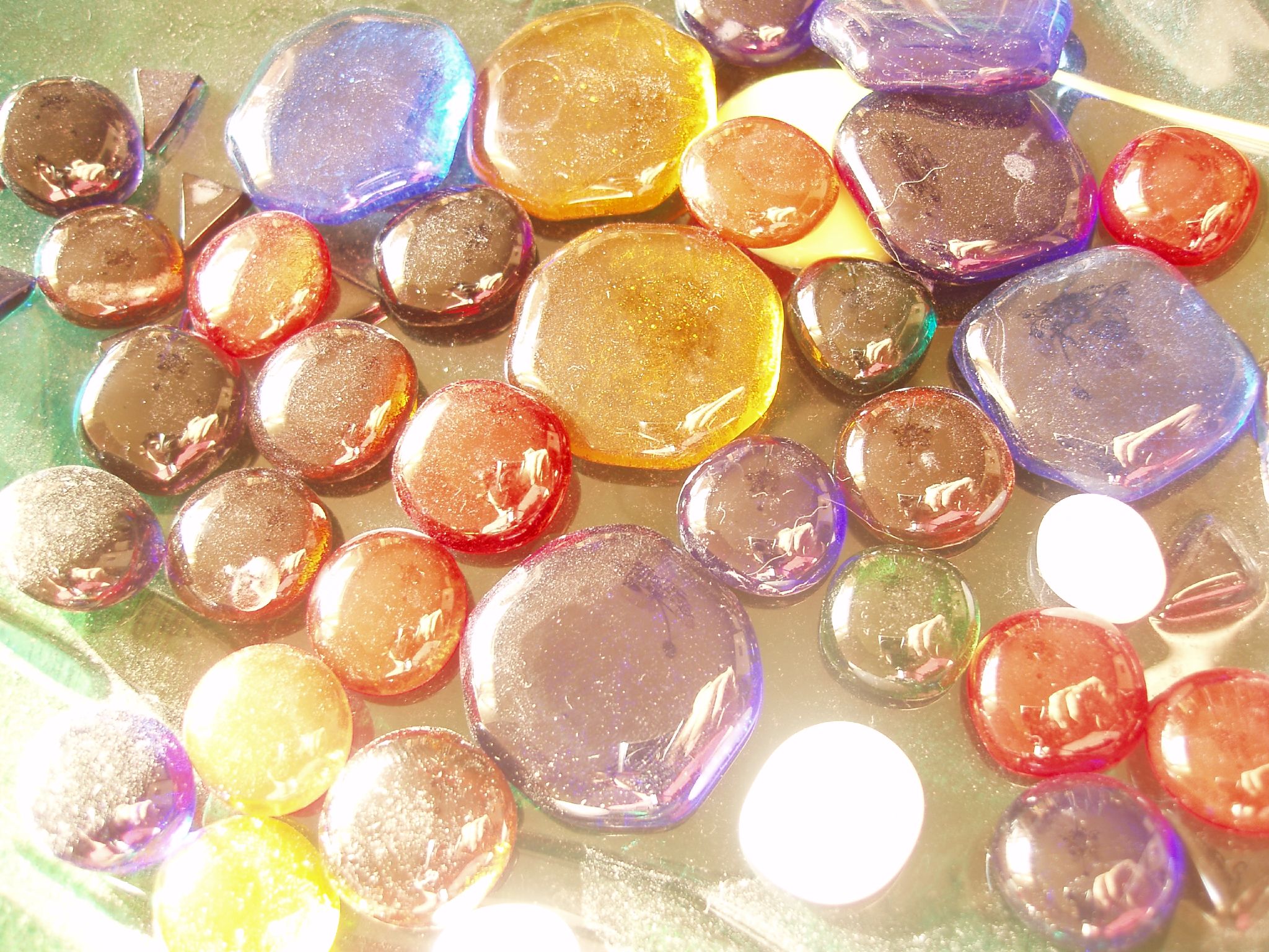 assortment of colored gummy bears sitting on table