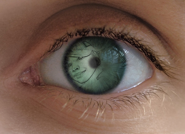 a person with green eyes has drawn a picture