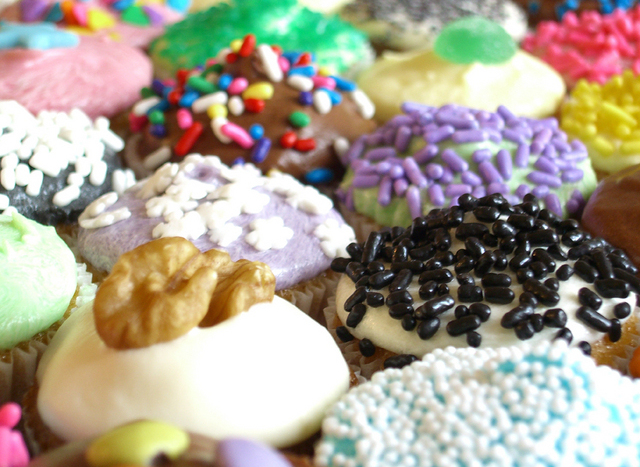 a large variety of colorful donuts on display