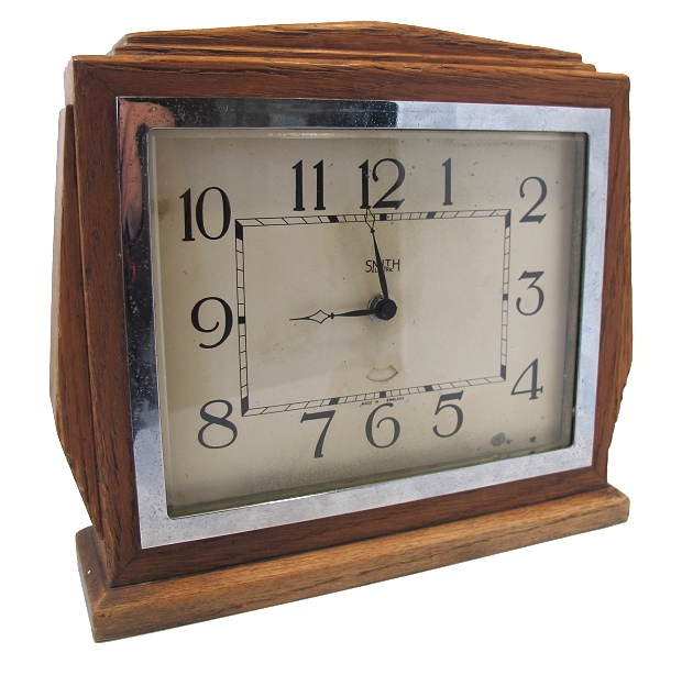 a wood and metal square clock that is displaying the time