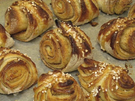 the pastries have been topped with seeds and brown sugar