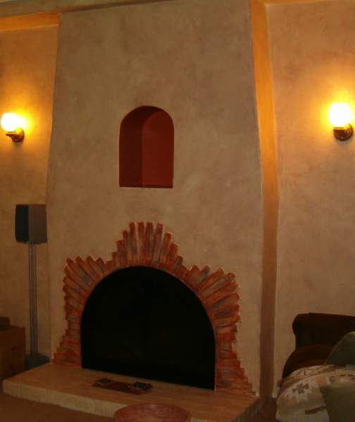a fire place in the corner of a room