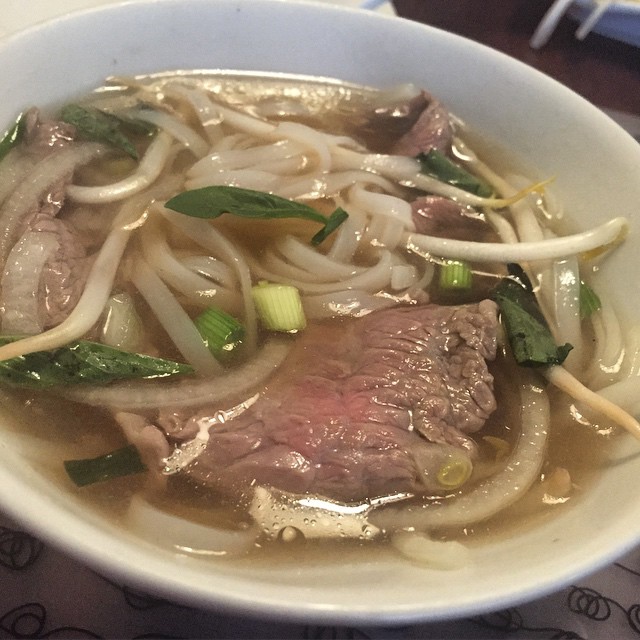a bowl that has some meat and noodles in it