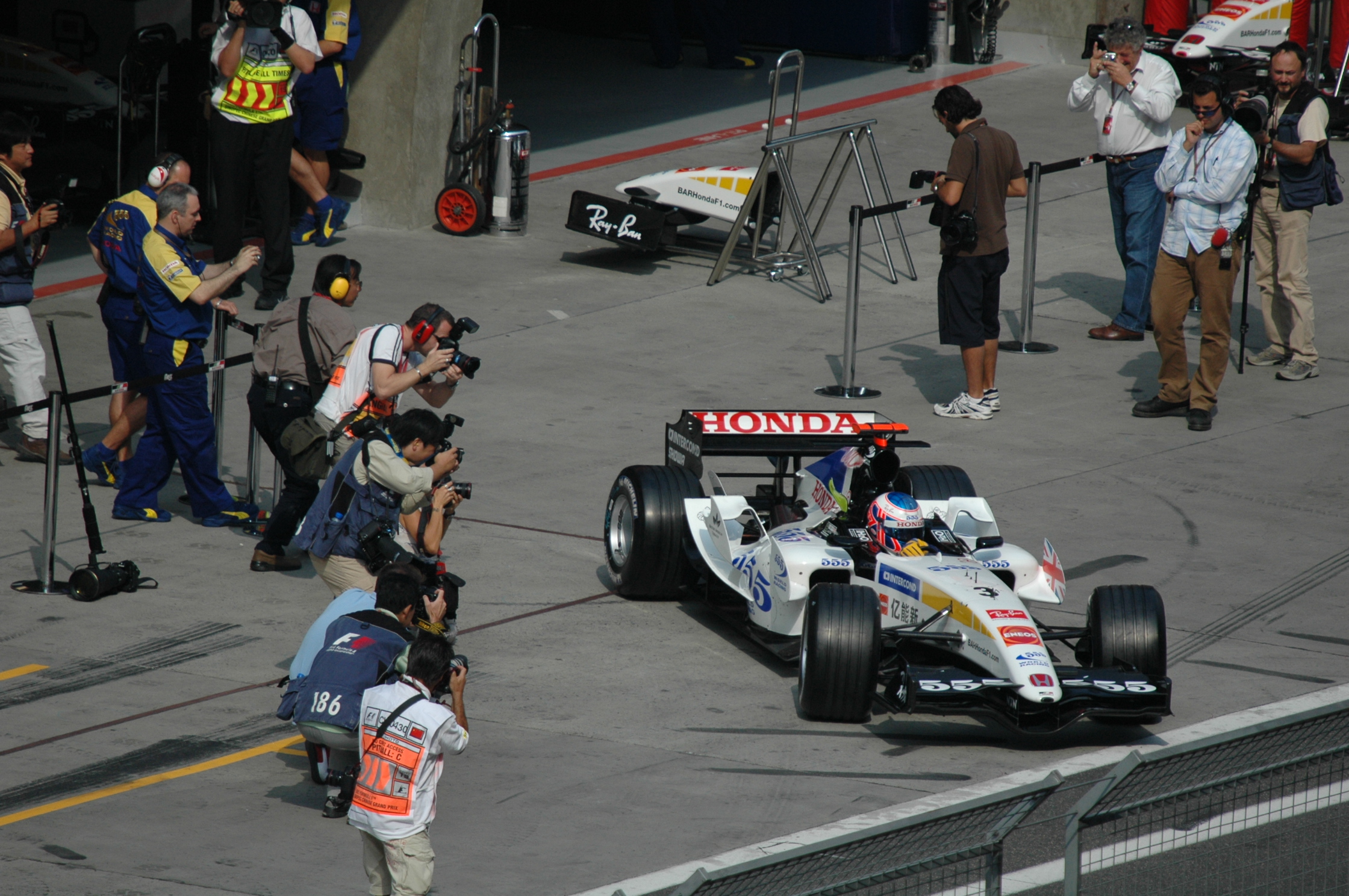 a person in a racing car getting ready to take a po