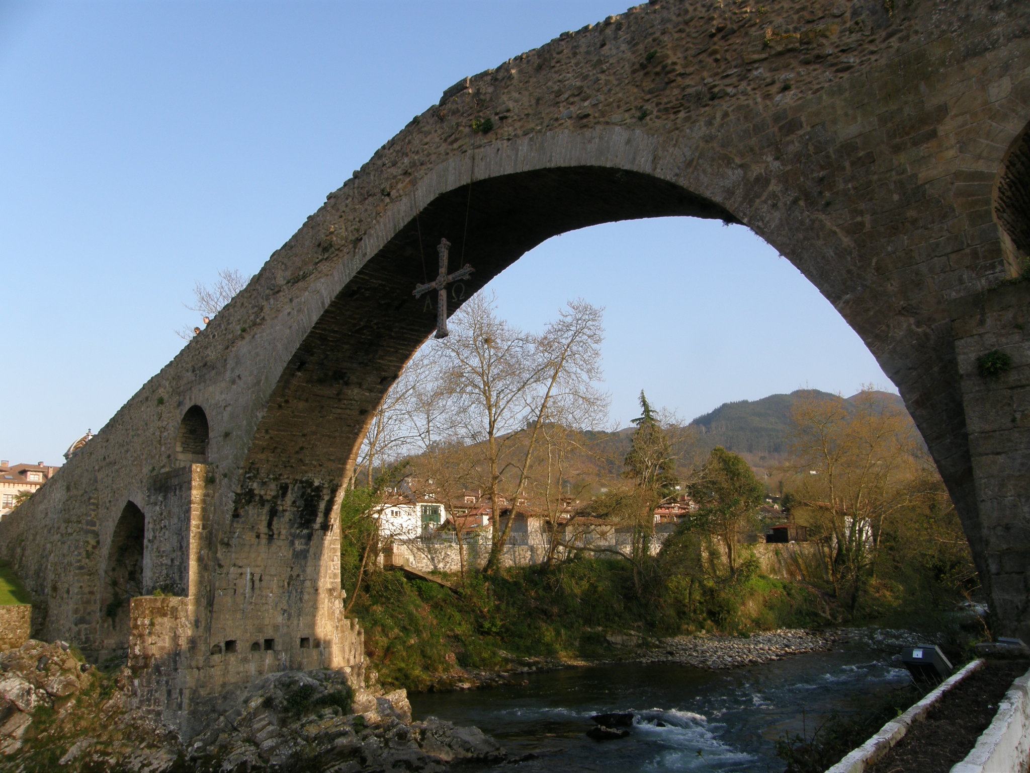 two bridges with the tops open over a river