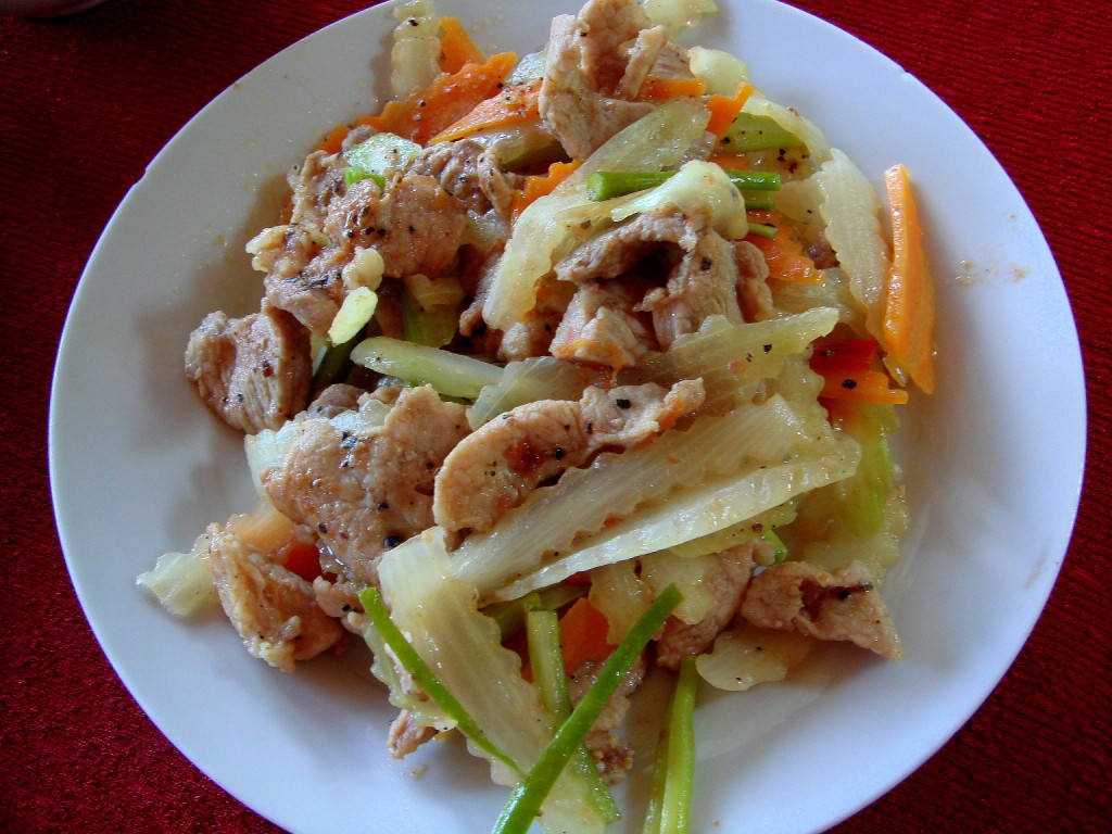 a white plate with some type of chinese dish on it