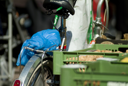 a couple of boxes of food are in a bicycle