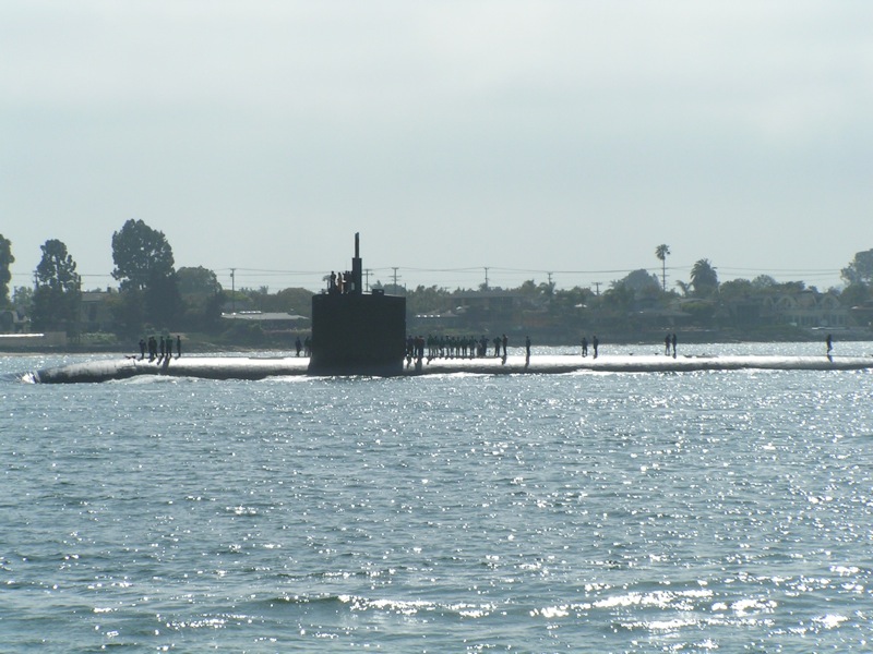 a large boat floating on top of a lake