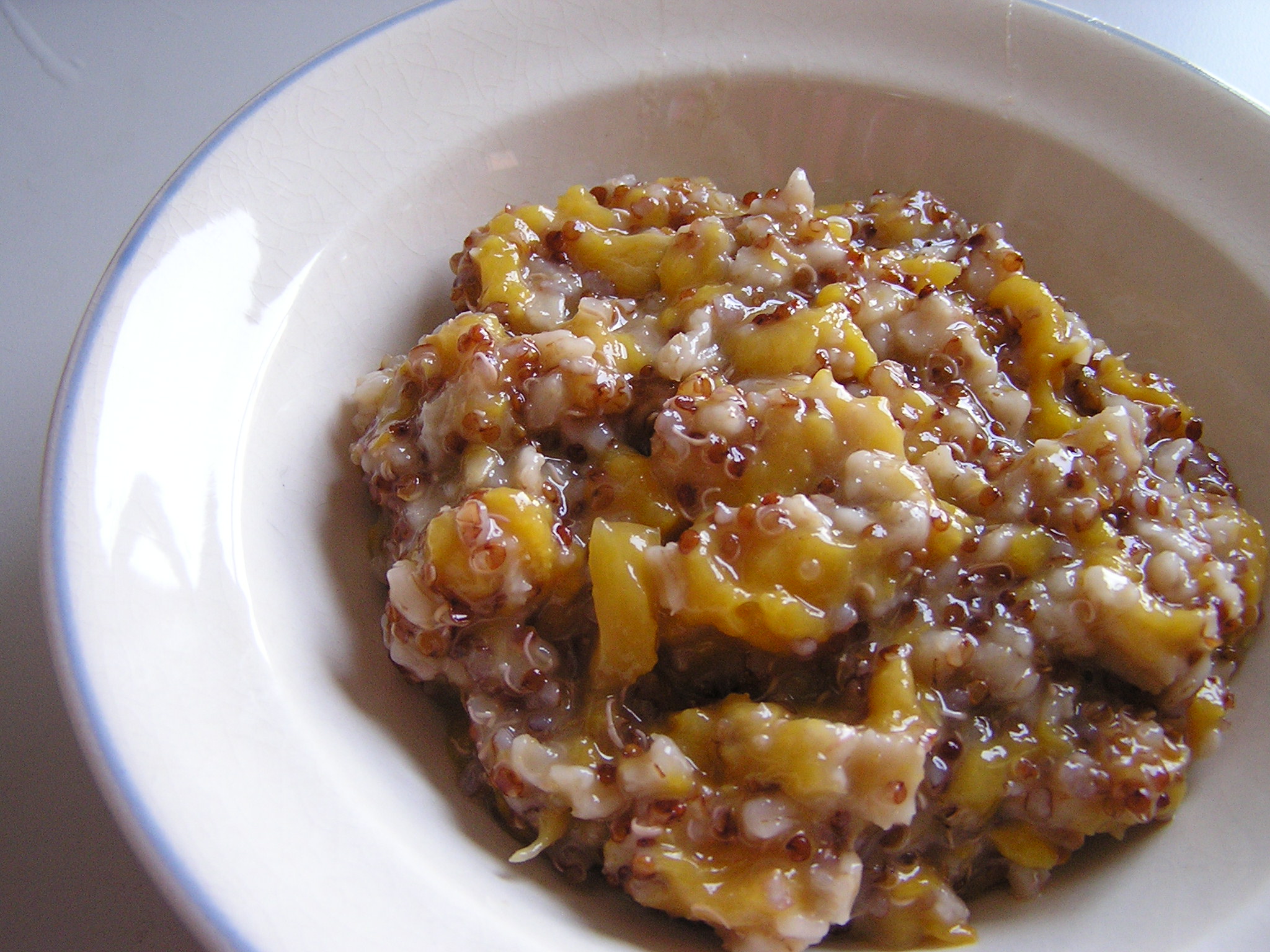 a plate with cheese is in a white bowl