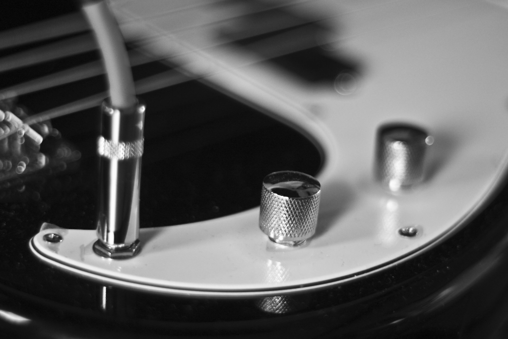 a white guitar with two small s