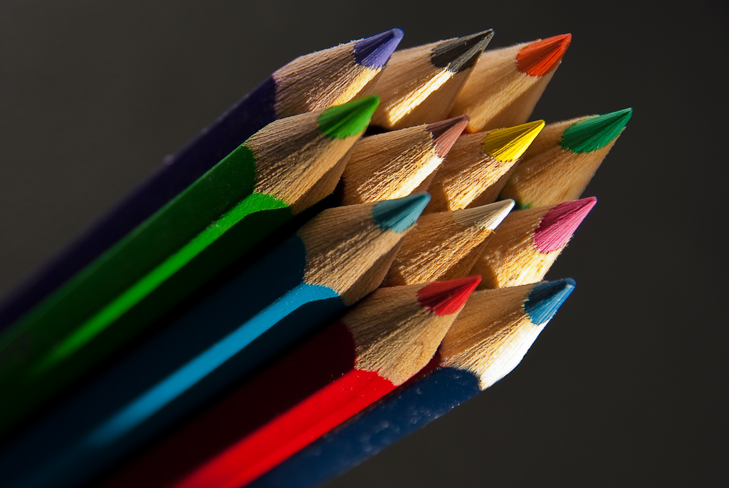 colorful pencils lined up in different colors