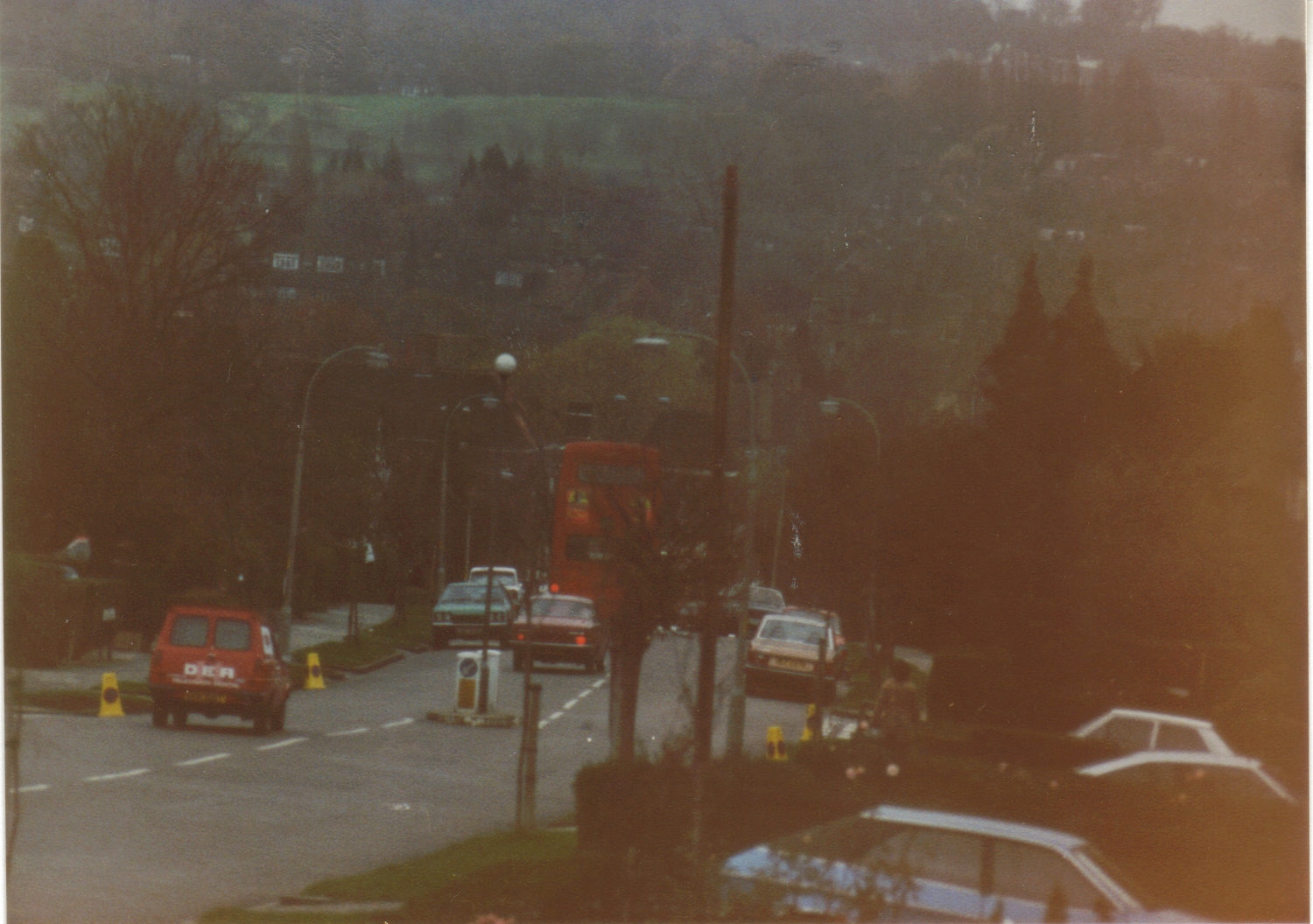 a street filled with traffic on both sides of it