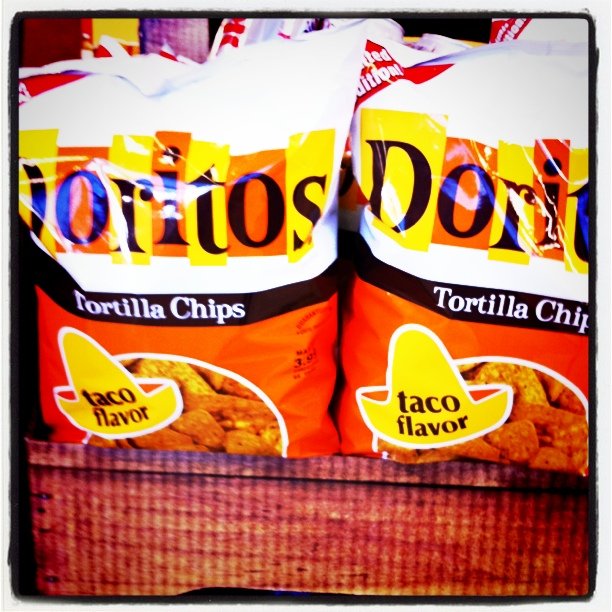 two bags of tortilla chips are shown side by side